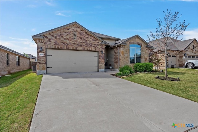 ranch-style home with a front lawn, central AC unit, and a garage