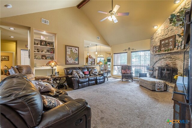 living room featuring carpet, high vaulted ceiling, ceiling fan, a fireplace, and beamed ceiling