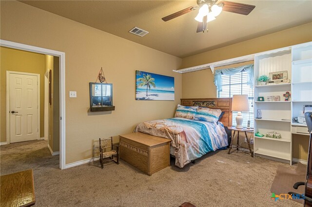 bedroom featuring light carpet and ceiling fan