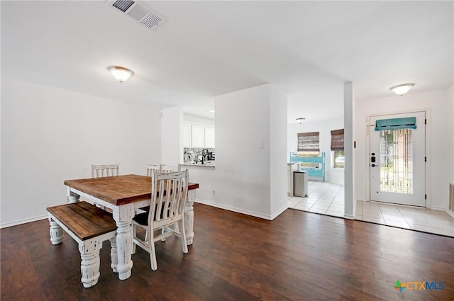 7410 Tom Watson Ct, San Antonio, TX 78244 - dining space with wood finished floors and baseboards