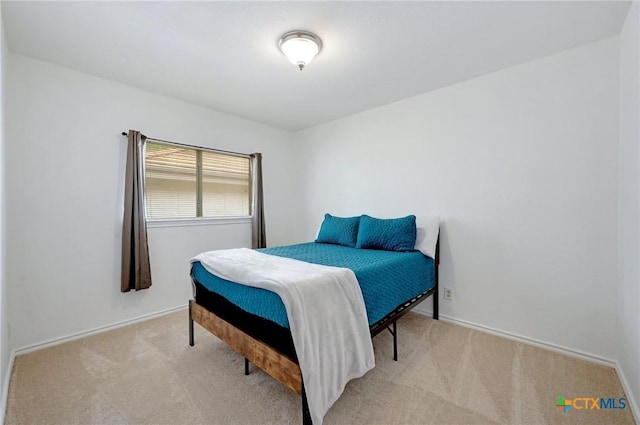 7410 Tom Watson Ct, San Antonio, TX 78244 - carpeted bedroom featuring baseboards
