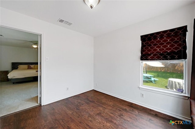 7410 Tom Watson Ct, San Antonio, TX 78244 - unfurnished bedroom with wood finished floors and baseboards