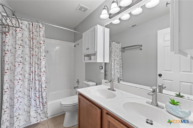 4904 Sodalite Ct, Killeen, TX 76542 - bathroom featuring toilet, double vanity, shower / tub combo with curtain, and tile patterned floors