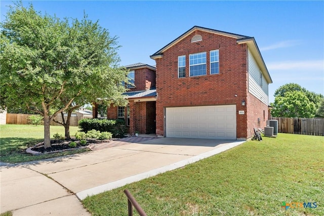 4904 Sodalite Ct, Killeen, TX 76542 - traditional home featuring an attached garage, concrete driveway, brick siding, and central air condition unit