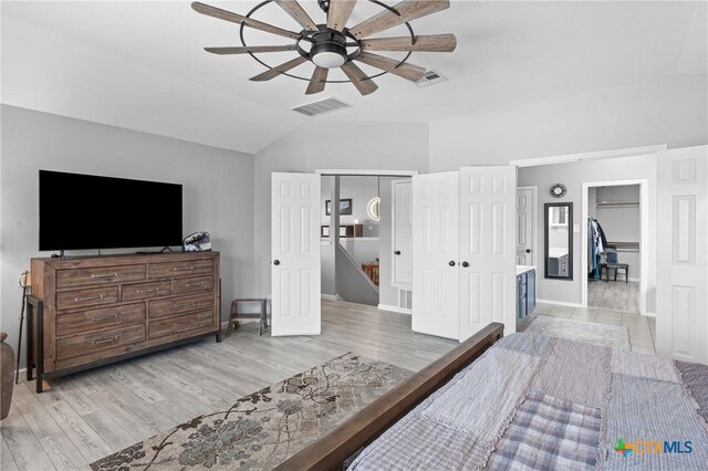 4904 Sodalite Ct, Killeen, TX 76542 - bedroom featuring lofted ceiling, light wood-type flooring, baseboards, and ceiling fan