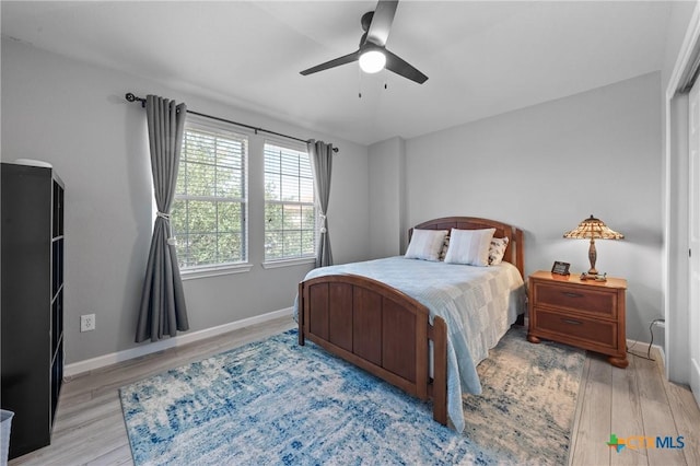 4904 Sodalite Ct, Killeen, TX 76542 - bedroom with light wood finished floors, baseboards, and a ceiling fan