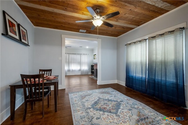 721 W Kings Hwy, San Antonio, TX 78212 - dining space with wood ceiling, a ceiling fan, crown molding, baseboards, and dark wood-type flooring