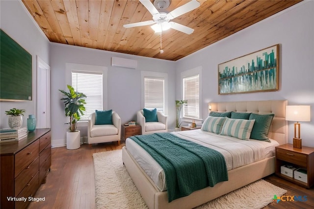 721 W Kings Hwy, San Antonio, TX 78212 - bedroom featuring wooden ceiling, wood-type flooring, a wall unit AC, a ceiling fan, and baseboards