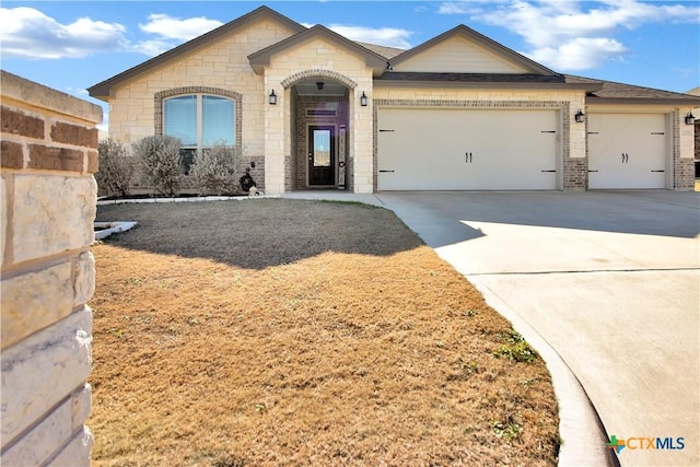 single story home with a garage