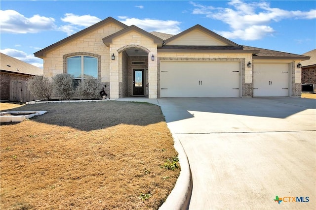 ranch-style home with a garage