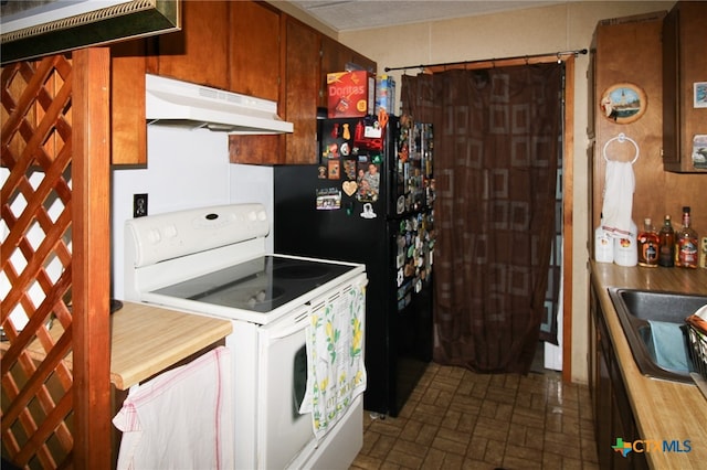 kitchen with white electric stove and sink