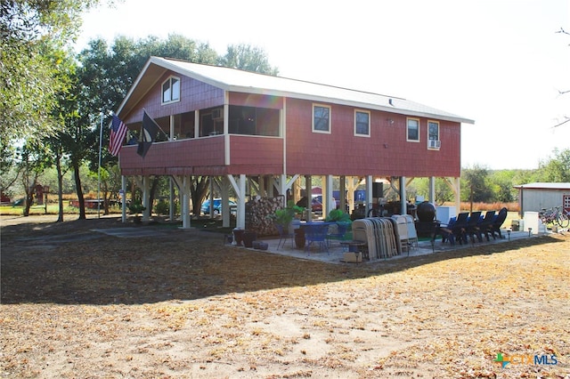 view of property's community featuring a patio