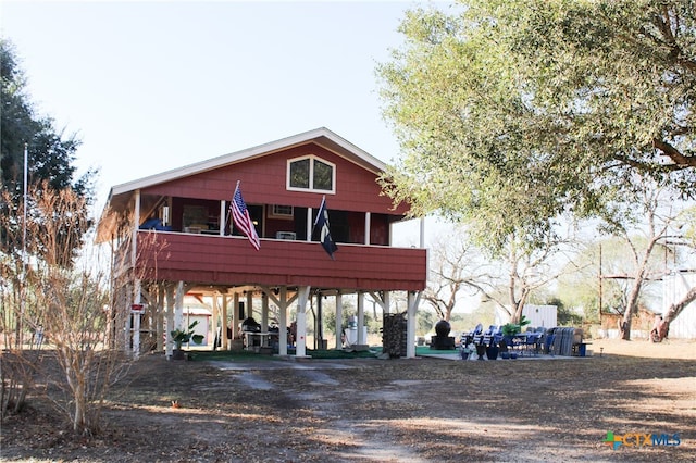 view of front of house with a carport