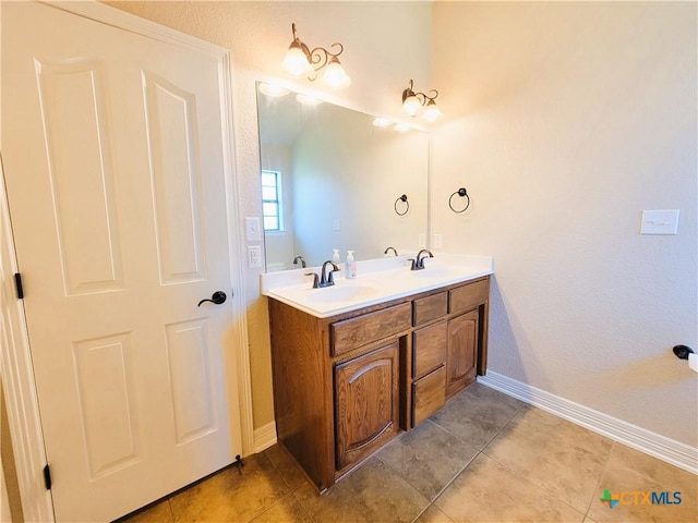 6409 Jovana Dr, Killeen, TX 76542 - bathroom featuring double vanity and tile patterned flooring