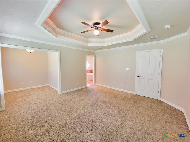 6409 Jovana Dr, Killeen, TX 76542 - carpeted spare room with a tray ceiling, ceiling fan, crown molding, and a smoke detector