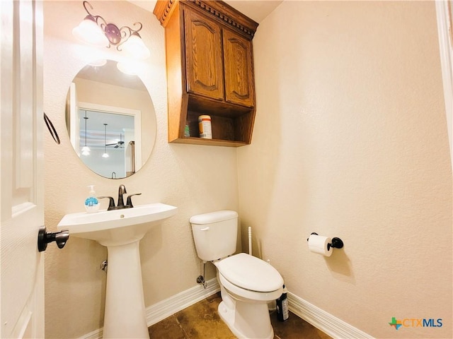 6409 Jovana Dr, Killeen, TX 76542 - bathroom featuring toilet and baseboards