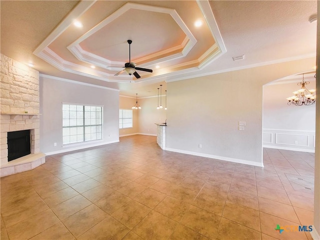 6409 Jovana Dr, Killeen, TX 76542 - unfurnished living room featuring a chandelier, a fireplace, ceiling fan, light tile patterned floors, and ornamental molding