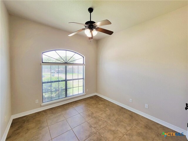 6409 Jovana Dr, Killeen, TX 76542 - spare room featuring light tile patterned flooring and a ceiling fan