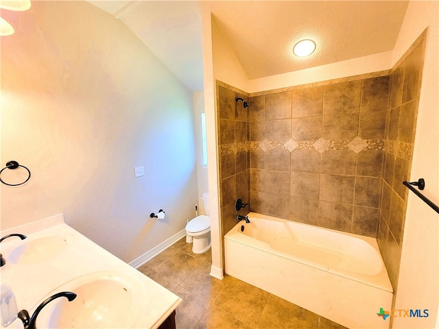 6409 Jovana Dr, Killeen, TX 76542 - full bath featuring vaulted ceiling, tile patterned flooring, tub / shower combination, and double vanity