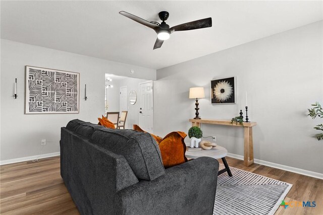 foyer with ceiling fan and light hardwood / wood-style flooring