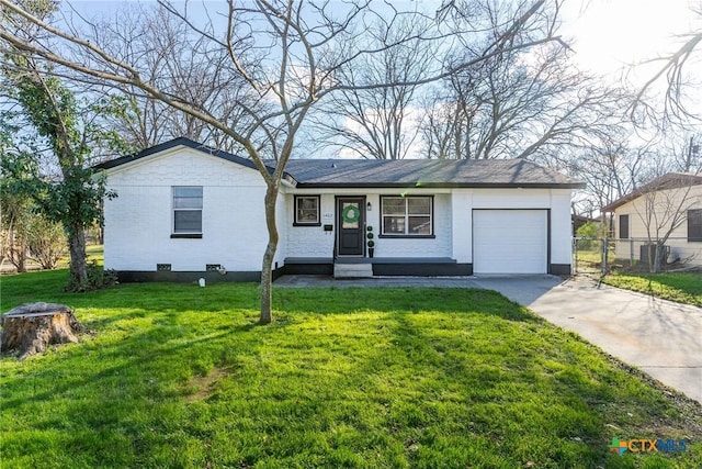 ranch-style house with a garage and a front lawn