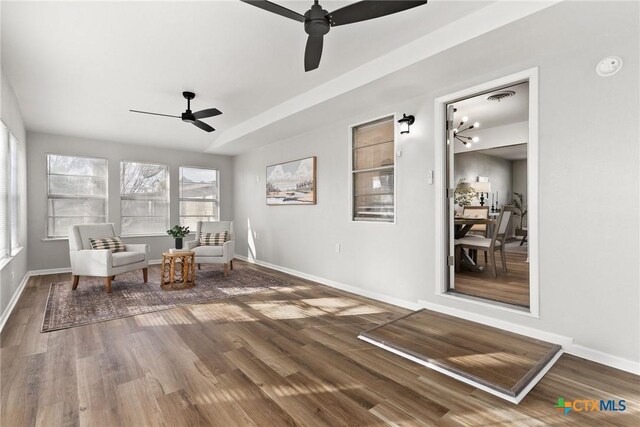 unfurnished bedroom with a closet, light hardwood / wood-style floors, and ceiling fan