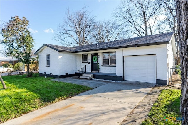 ranch-style house featuring a garage and a front yard