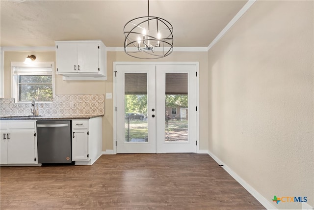 kitchen with french doors, backsplash, decorative light fixtures, white cabinets, and stainless steel dishwasher