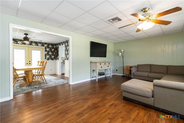 1322 Rivercrest Dr, New Braunfels, TX 78130 - living room featuring ceiling fan, wood finished floors, baseboards, and a drop ceiling
