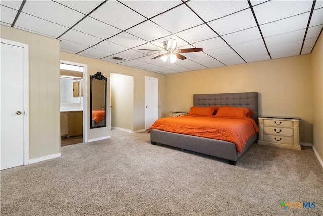 1322 Rivercrest Dr, New Braunfels, TX 78130 - bedroom with carpet, ensuite bath, ceiling fan, and baseboards