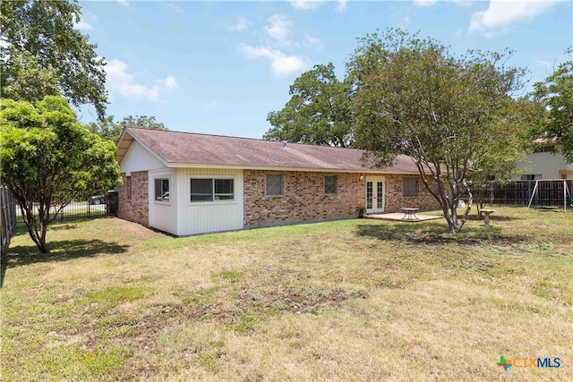1322 Rivercrest Dr, New Braunfels, TX 78130 - back of house with french doors and brick siding