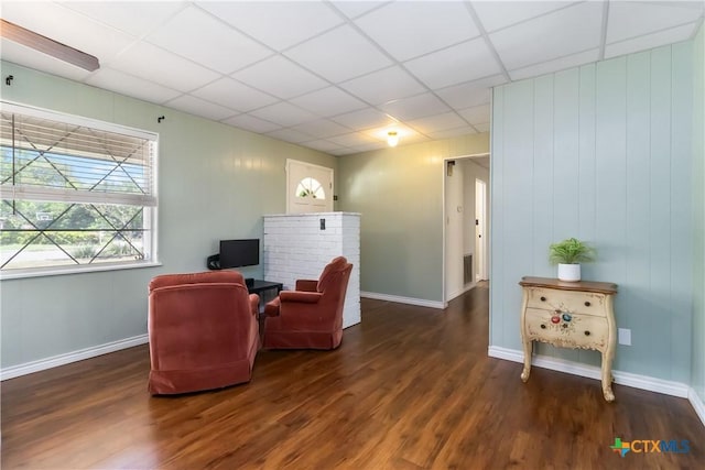 1322 Rivercrest Dr, New Braunfels, TX 78130 - living area with a paneled ceiling, wood finished floors, and baseboards