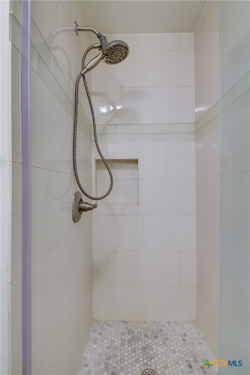 bathroom with a stall shower