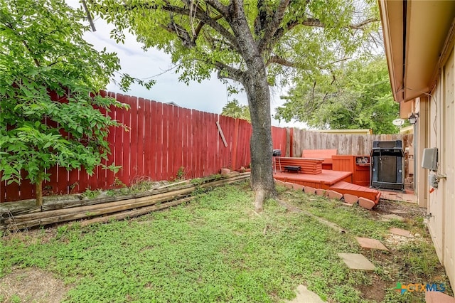 view of yard with a fenced backyard