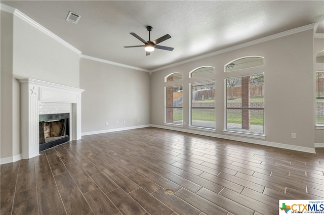 unfurnished living room with dark wood-type flooring, a textured ceiling, and ceiling fan