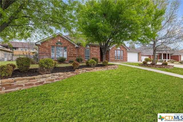 ranch-style house featuring a garage, central AC, and a front yard