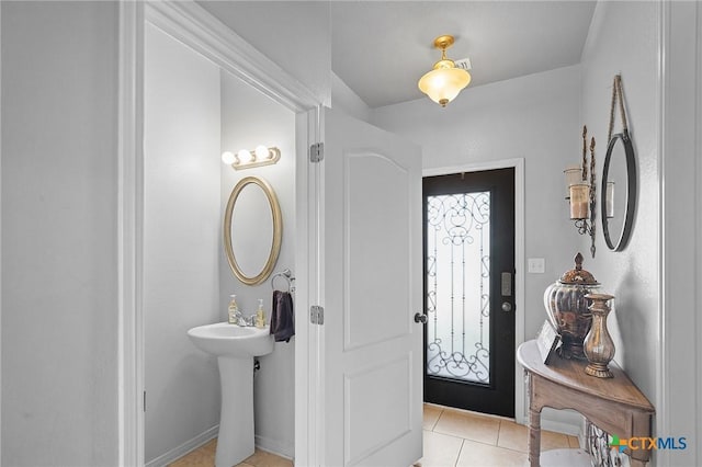 125 Flint Rock Ct, Victoria, TX 77904 - entryway featuring light tile patterned floors