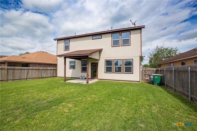 125 Flint Rock Ct, Victoria, TX 77904 - back of house featuring a patio area and stucco siding