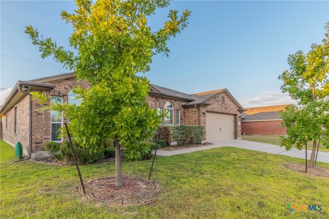 single story home featuring a front lawn and a garage