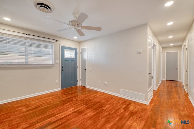 entrance foyer featuring light wood-type flooring and ceiling fan