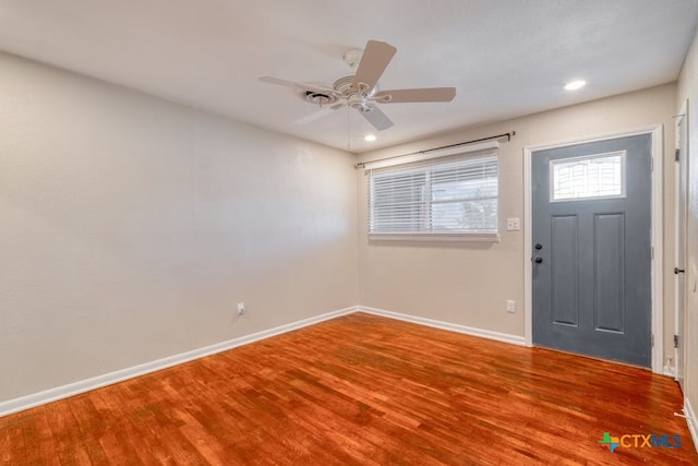 entrance foyer featuring wood-type flooring and ceiling fan