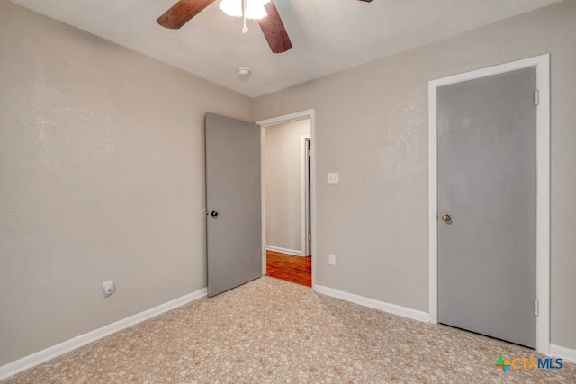 unfurnished bedroom with ceiling fan