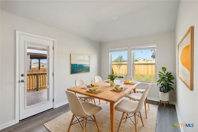 dining room featuring dark hardwood / wood-style flooring