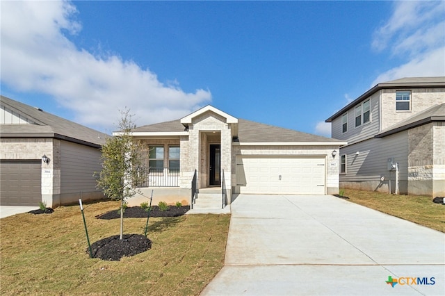 view of front of house with a front lawn, a porch, and a garage