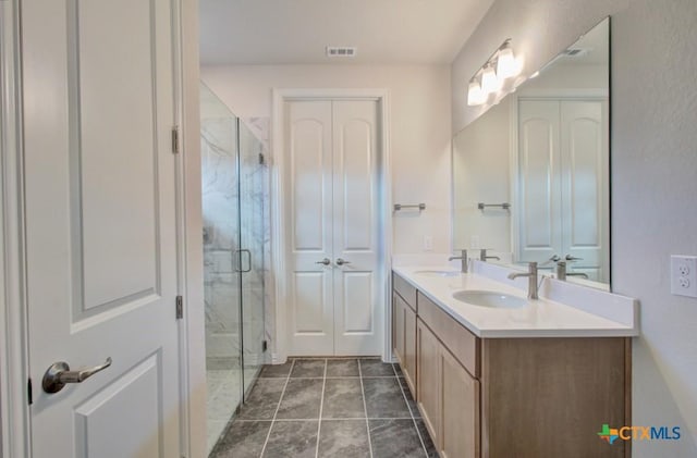 2829 Maximilian Ln, New Braunfels, TX 78130 - bathroom with double vanity and a marble finish shower