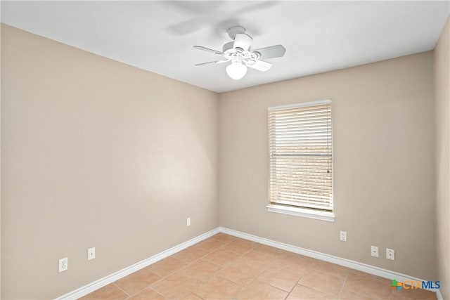 2153 Keystone Dr, New Braunfels, TX 78130 - unfurnished room with a ceiling fan, baseboards, and light tile patterned flooring