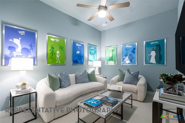 221 Dycus Bnd, Liberty Hill, TX 78642 - living area with ceiling fan and carpet floors