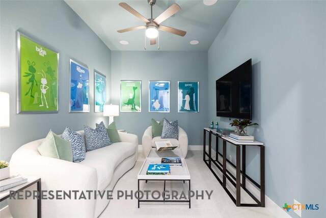 221 Dycus Bnd, Liberty Hill, TX 78642 - living room featuring a ceiling fan and baseboards