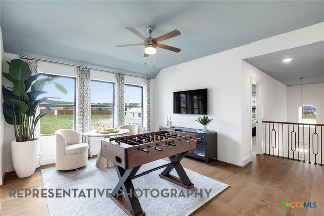 221 Dycus Bnd, Liberty Hill, TX 78642 - game room featuring ceiling fan, wood finished floors, baseboards, and recessed lighting