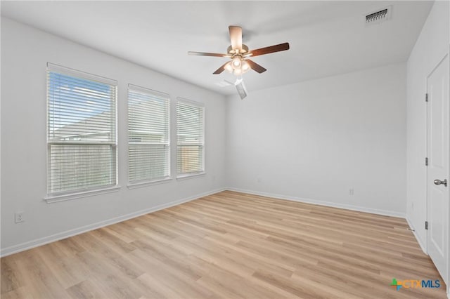 607 Killam Dr, Temple, TX 76502 - spare room with a ceiling fan, light wood finished floors, and baseboards